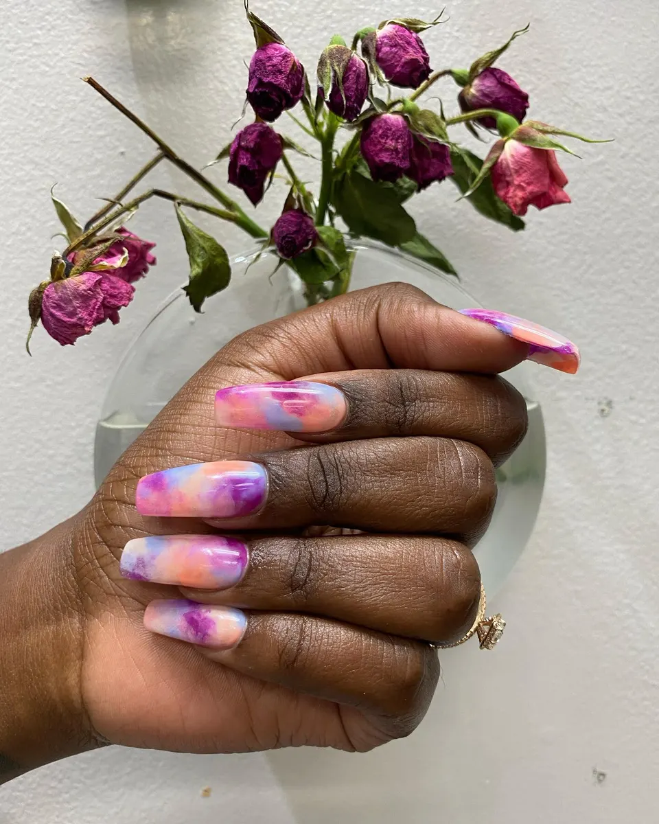 Neutral nails with cobalt blue linework